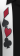 Precision embroidery detail of Spades, Hearts, Diamonds, and Clubs on a USA-made poker shirt, high-definition casino aficionado style.