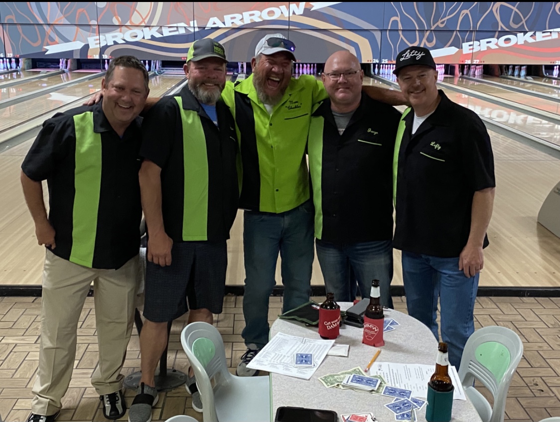 Broken Arrow League team wearing custom lime green and black retro bowling shirts on the lanes – USA made